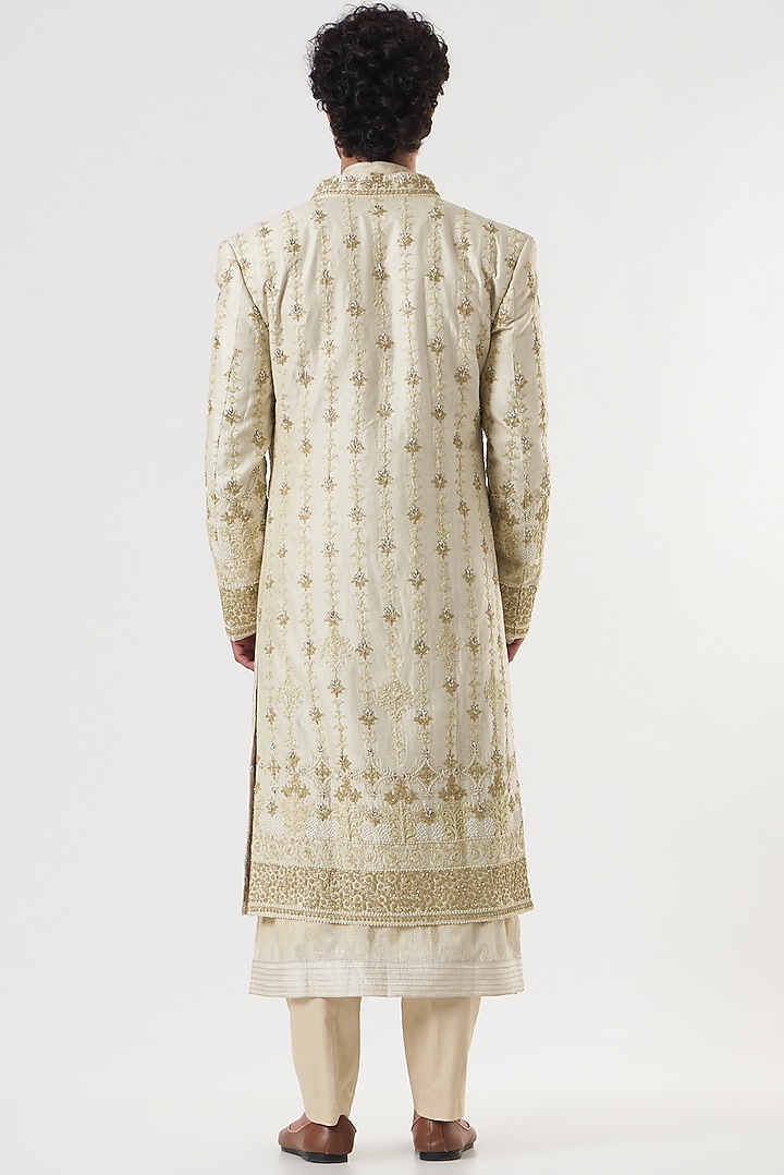 Cream Handloom Silk Zardosi Embroidered Groom Sherwani Set by Ritu & Abhishek at Pernia's Pop Up Shop