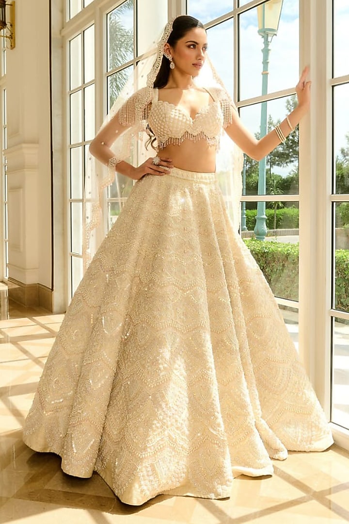 Ivory Raw Silk Pearl Embroidered Bridal Lehenga Set by Rianta's at Pernia's Pop Up Shop
