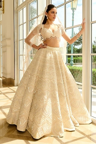 Ivory Raw Silk Pearl Embroidered Lehenga Set by Rianta's