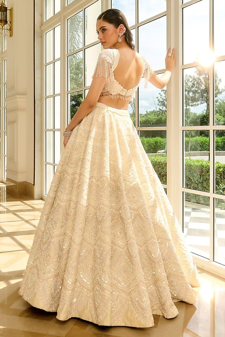 Ivory Raw Silk Pearl Embroidered Bridal Lehenga Set by Rianta's at Pernia's Pop Up Shop