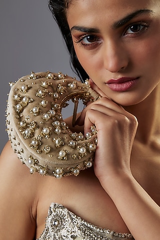 Beige Suede Pearl Embellished Clutch by Ricammo