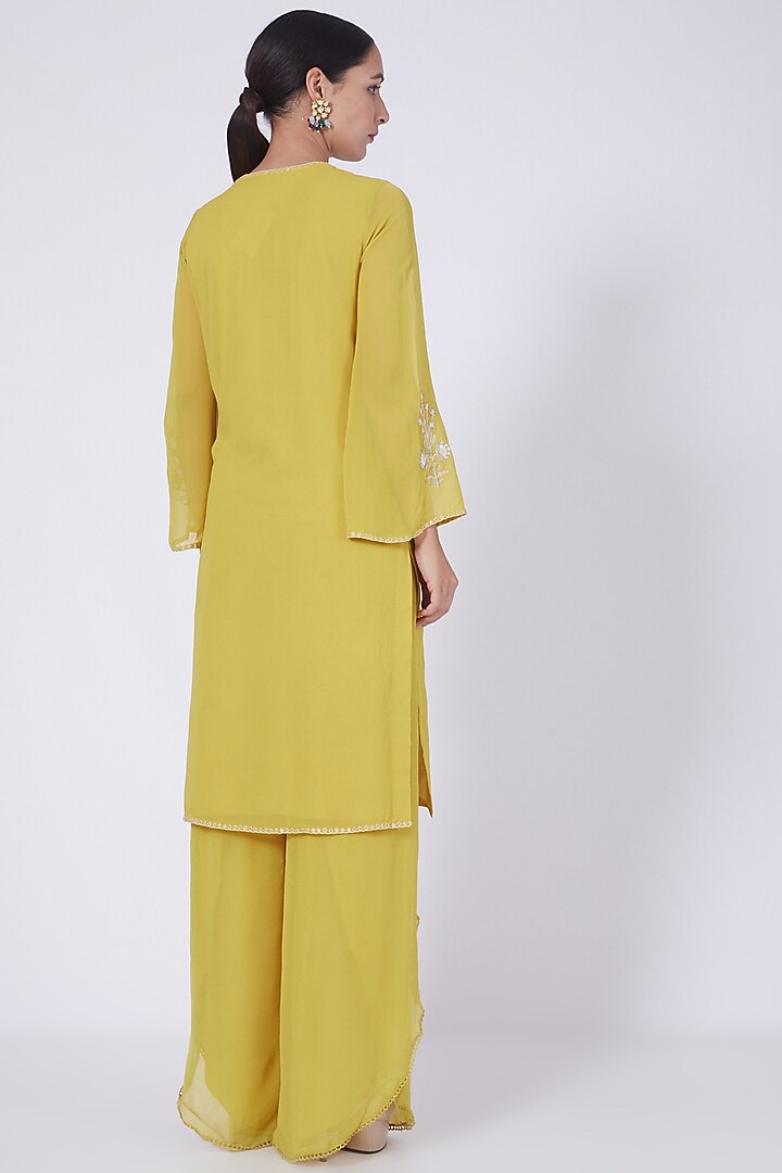 Mustard Hand Embroidered Kurta Set by Ridhi agarwal at Pernia's Pop Up Shop