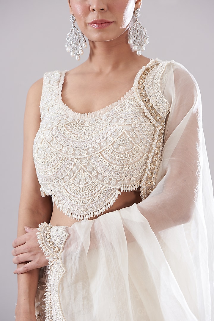 Ivory Organza Hand Embroidered Bridal Lehenga Set by Ridhima Bhasin at Pernia's Pop Up Shop
