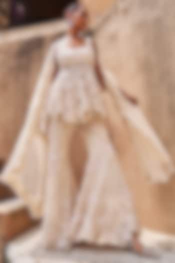Ivory Net & Organza Hand Embroidered Peplum Kurta Set by Ridhima Bhasin at Pernia's Pop Up Shop