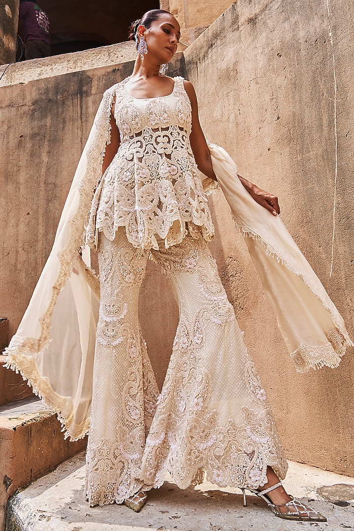 Ivory Net & Organza Hand Embroidered Peplum Kurta Set by Ridhima Bhasin at Pernia's Pop Up Shop