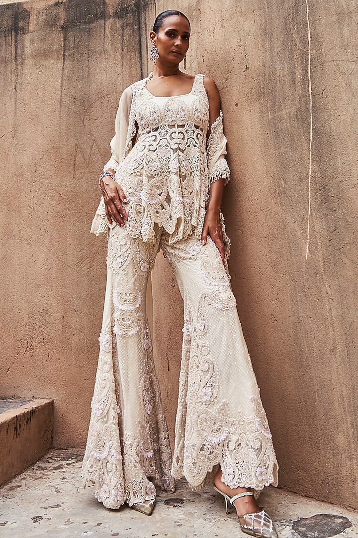 Ivory Net & Organza Hand Embroidered Peplum Kurta Set by Ridhima Bhasin at Pernia's Pop Up Shop