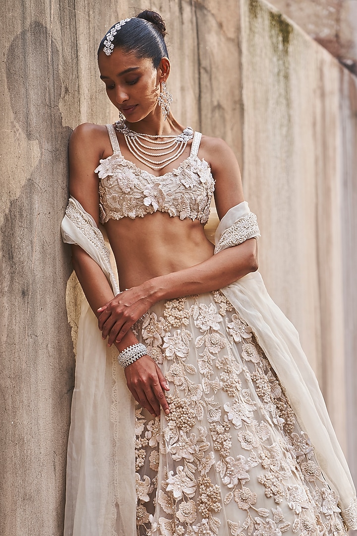 Ivory Net & Organza Embroidered Bridal Lehenga Set by Ridhima Bhasin at Pernia's Pop Up Shop