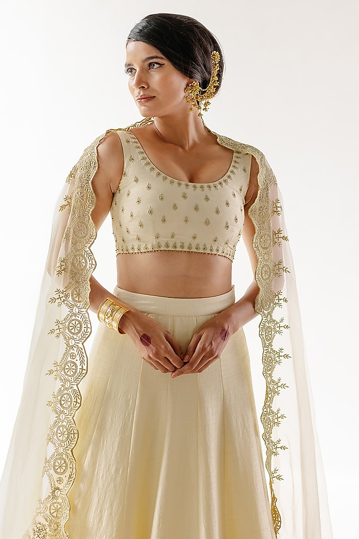 Ivory Viscose Raw Silk & Pure Cotton Voile Resham Embroidered Wedding Lehenga Set by Ridhimaa Gupta at Pernia's Pop Up Shop