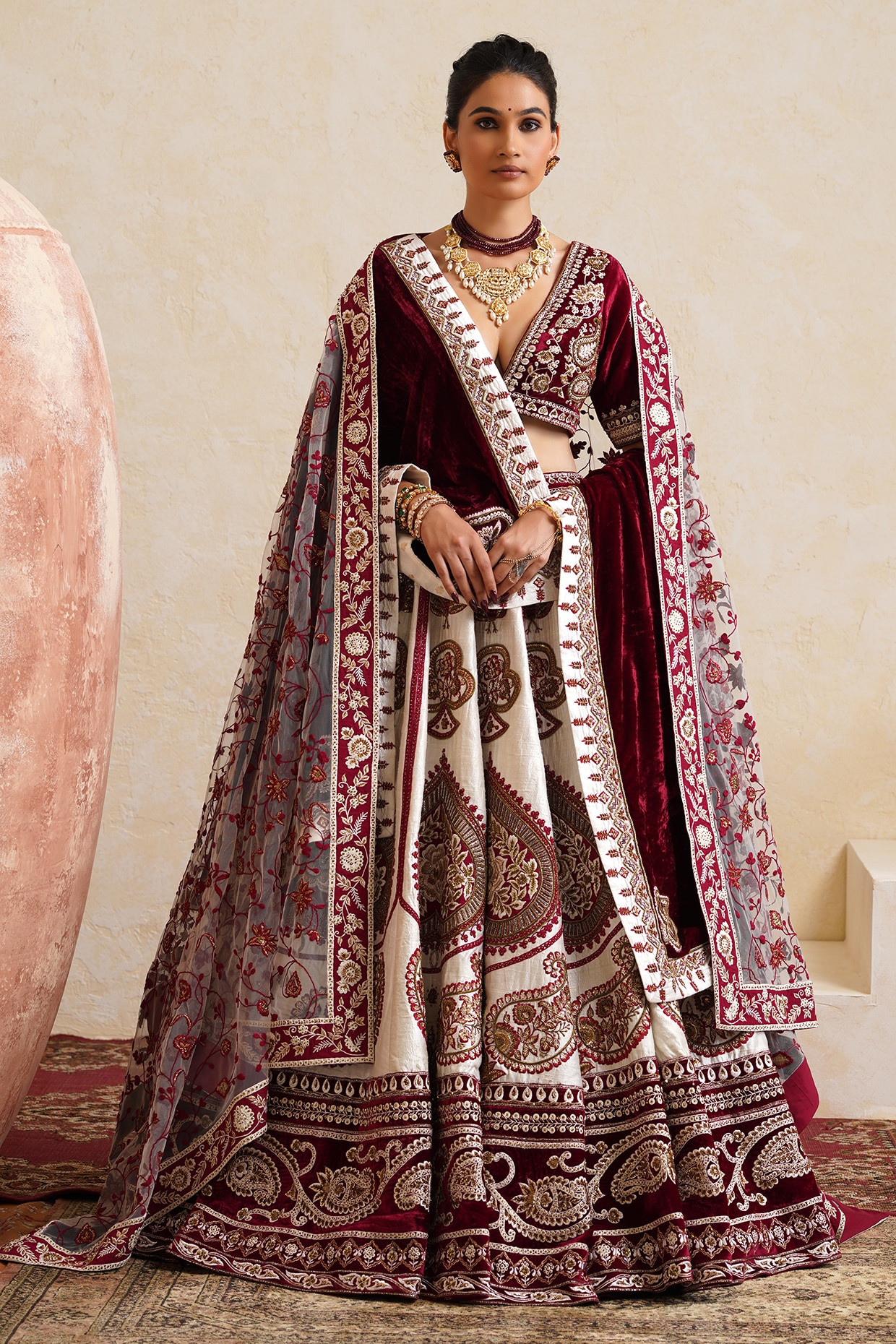 Ridhi garg Ivory Raw Silk Hand & Machine Embroidered Bridal Lehenga Set