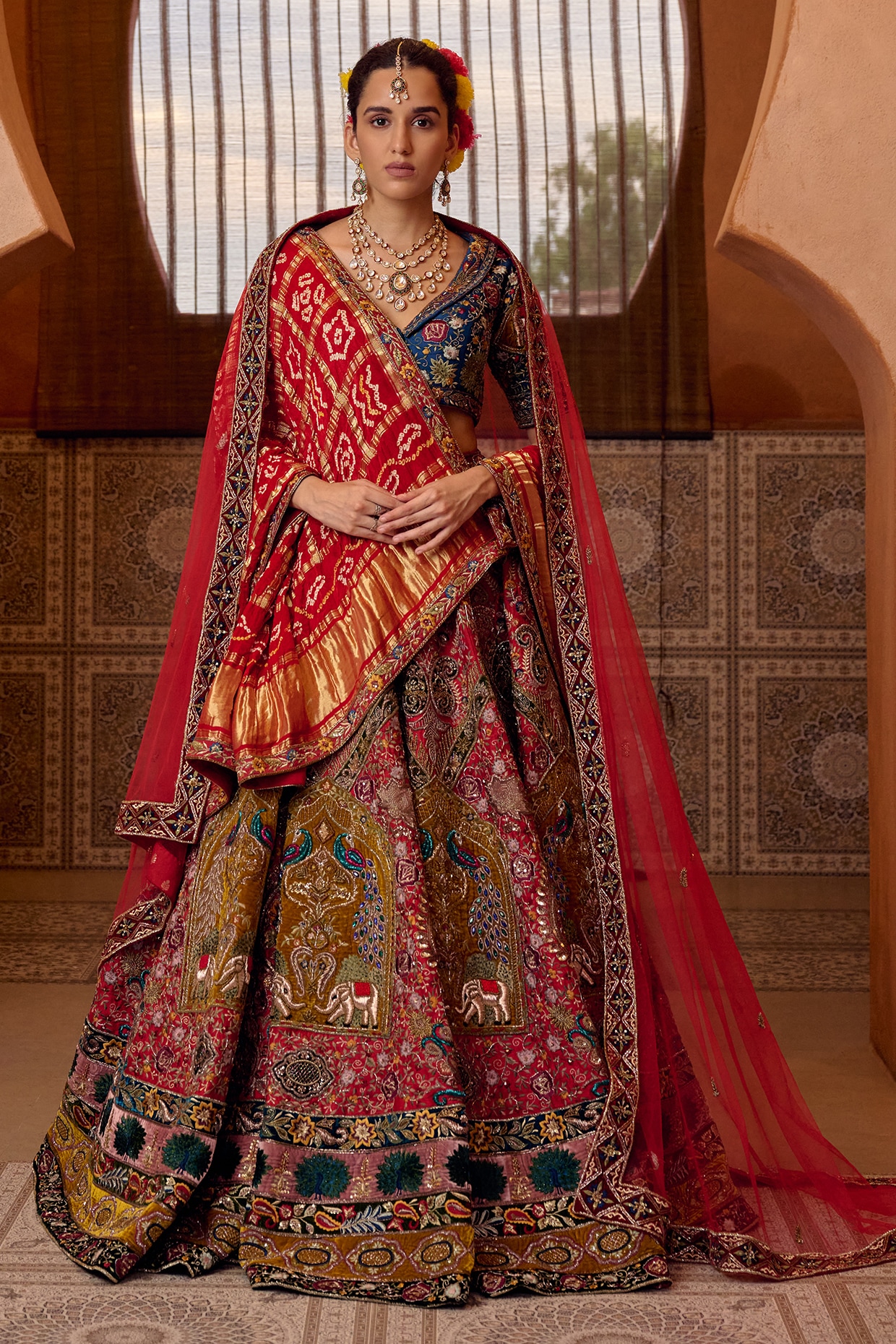 Ridhi garg Red Raw Silk Motif Hand Embroidered Bridal Lehenga Set