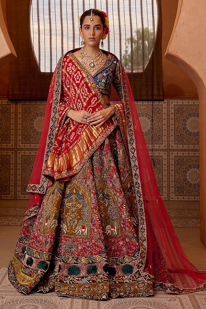 Red Raw Silk Motif Hand Embroidered Bridal Bridal Lehenga Set by Ridhi garg at Pernia's Pop Up Shop