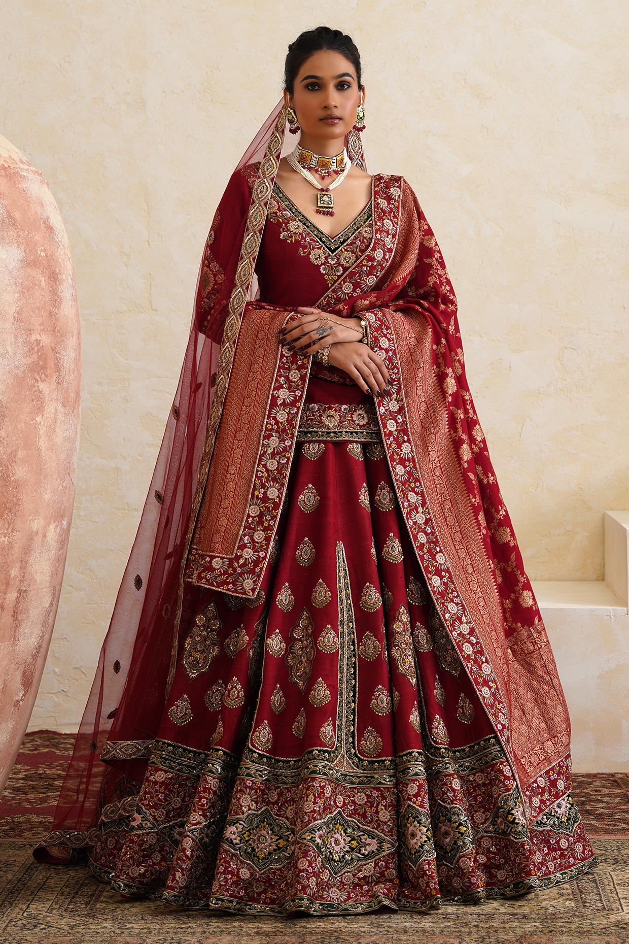 Ridhi garg Maroon Raw Silk Resham Hand Embroidered Bridal Lehenga Set
