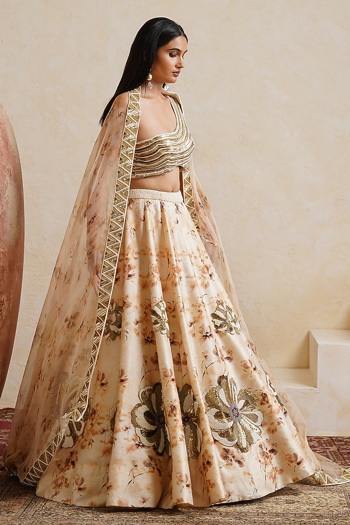 Ivory Raw Silk Floral Printed & Hand Embroidered Bridal Bridal Lehenga Set by Ridhi garg at Pernia's Pop Up Shop
