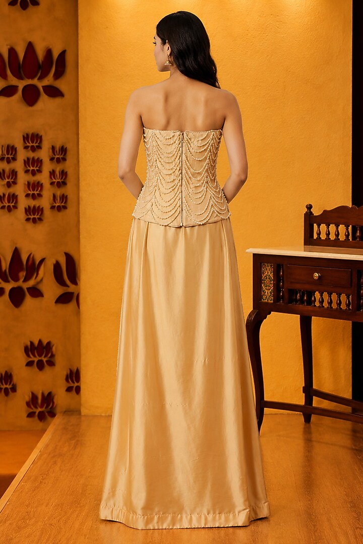 Ivory Satin Silk Pleated Skirt Set by Ridhi garg at Pernia's Pop Up Shop