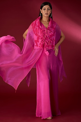 Fuchsia Modal Satin Jumpsuit With Organza Cape by Richa Khemka