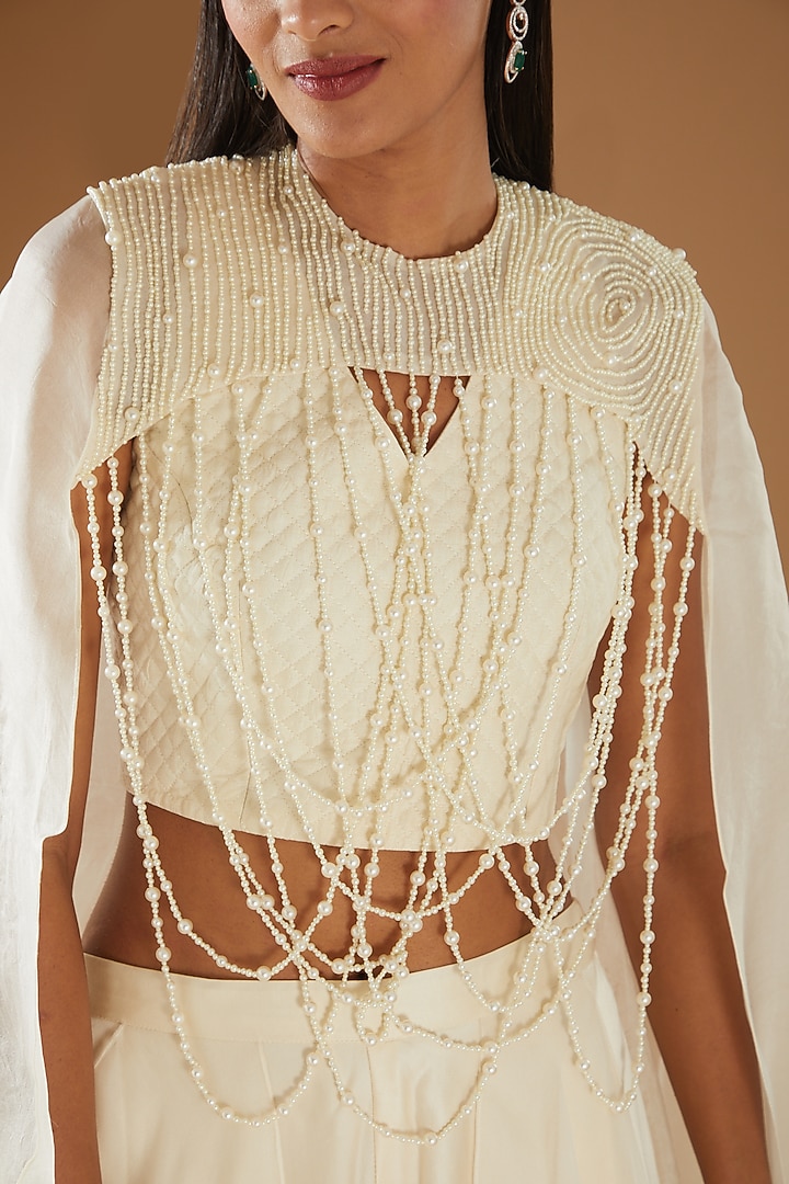Pearl White Embroidered Wedding Lehenga Set by Richa Khemka at Pernia's Pop Up Shop