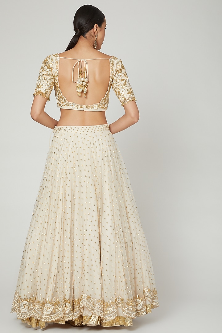Ivory Sequins Embroidered Bridal Lehenga Set by RRishita & Mitali at Pernia's Pop Up Shop