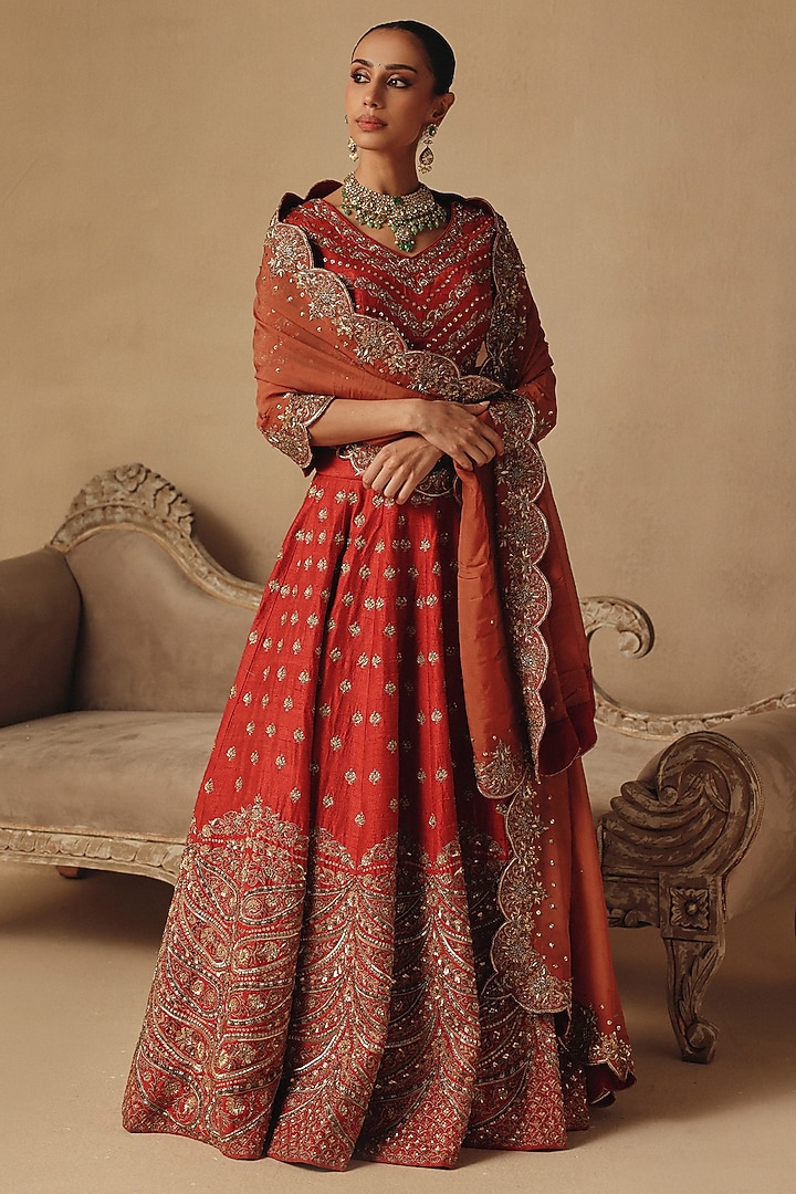 Orange Raw Silk Hand Embroidered Bridal Lehenga Set by Rishika Singh at Pernia's Pop Up Shop