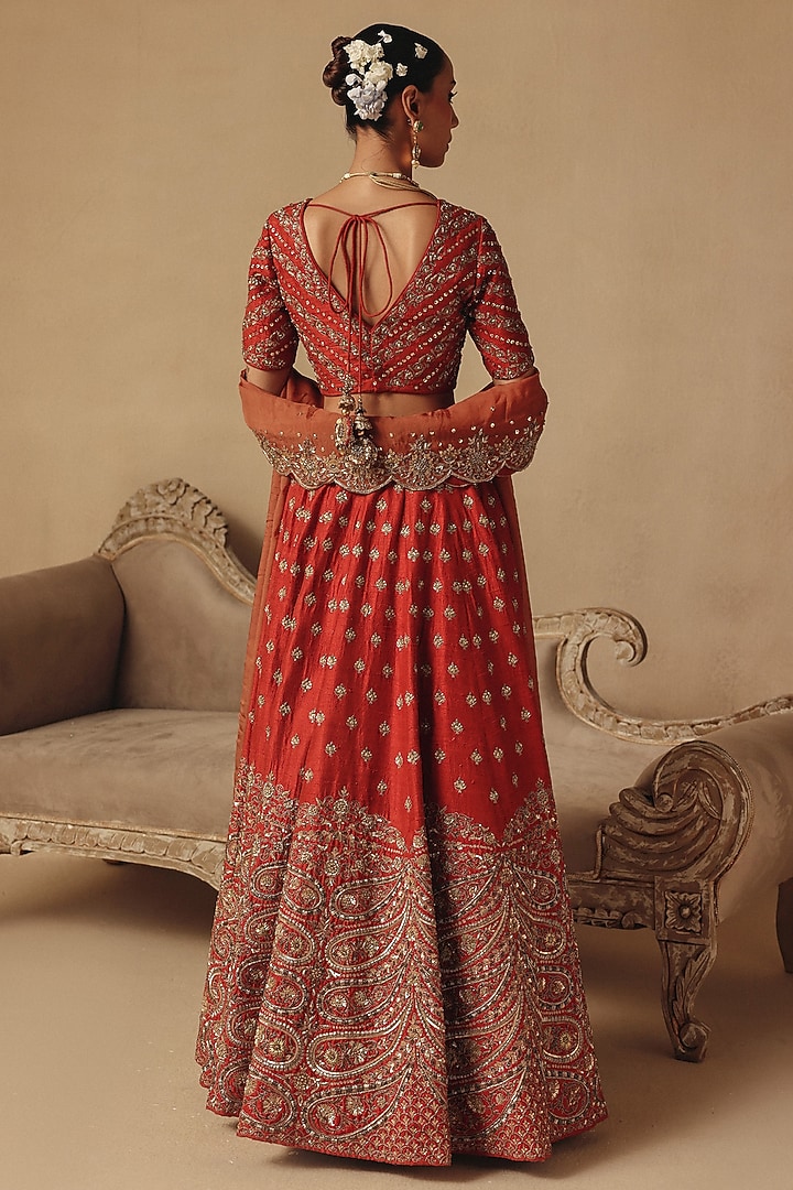 Orange Raw Silk Hand Embroidered Bridal Lehenga Set by Rishika Singh at Pernia's Pop Up Shop