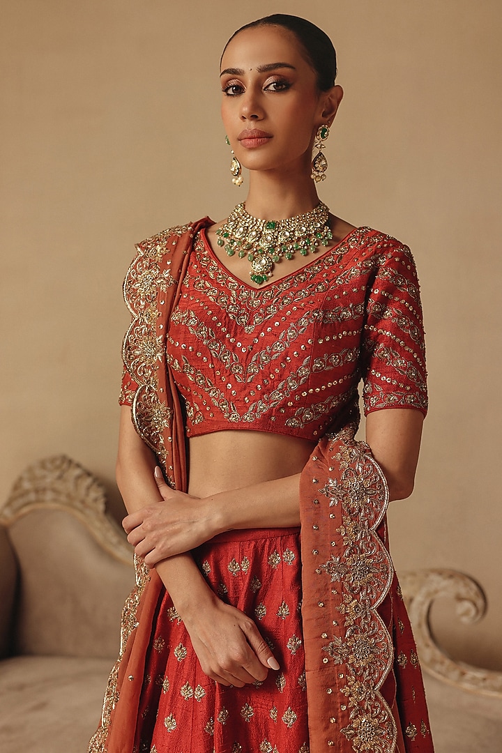 Orange Raw Silk Hand Embroidered Bridal Lehenga Set by Rishika Singh at Pernia's Pop Up Shop