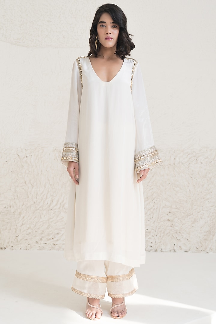 Ivory Organza Cutwork Embroidered Kurta Set by Rishi & Vibhuti at Pernia's Pop Up Shop