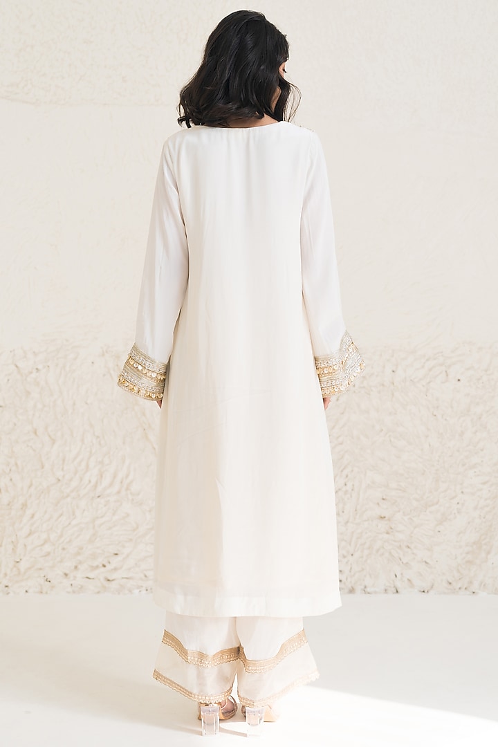 Ivory Organza Cutwork Embroidered Kurta Set by Rishi & Vibhuti at Pernia's Pop Up Shop