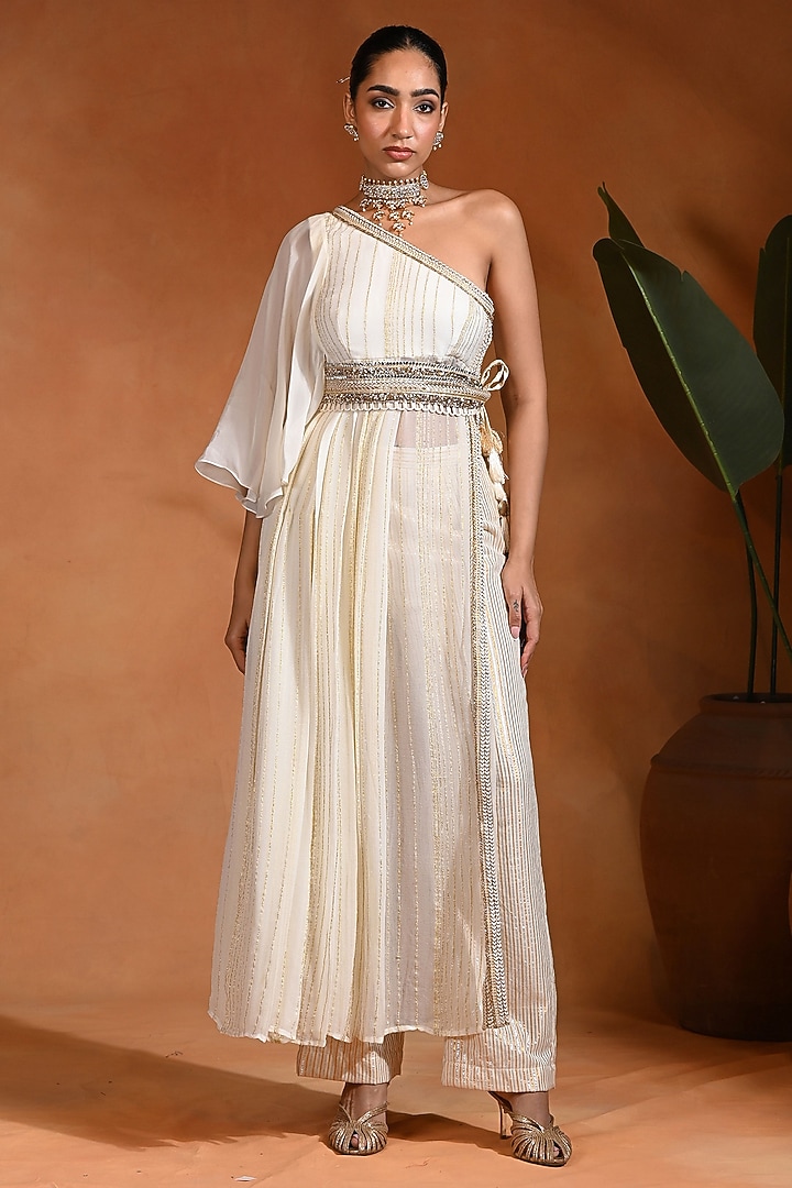 Ivory Viscose Georgette One-Shoulder Kurta Set by Rishi & Vibhuti at Pernia's Pop Up Shop