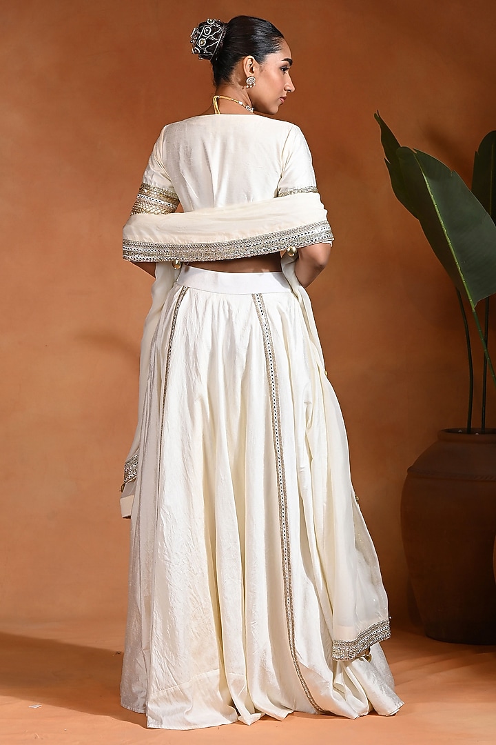 Ivory Dupion Silk Cord Embroidered Wedding Lehenga Set by Rishi & Vibhuti at Pernia's Pop Up Shop