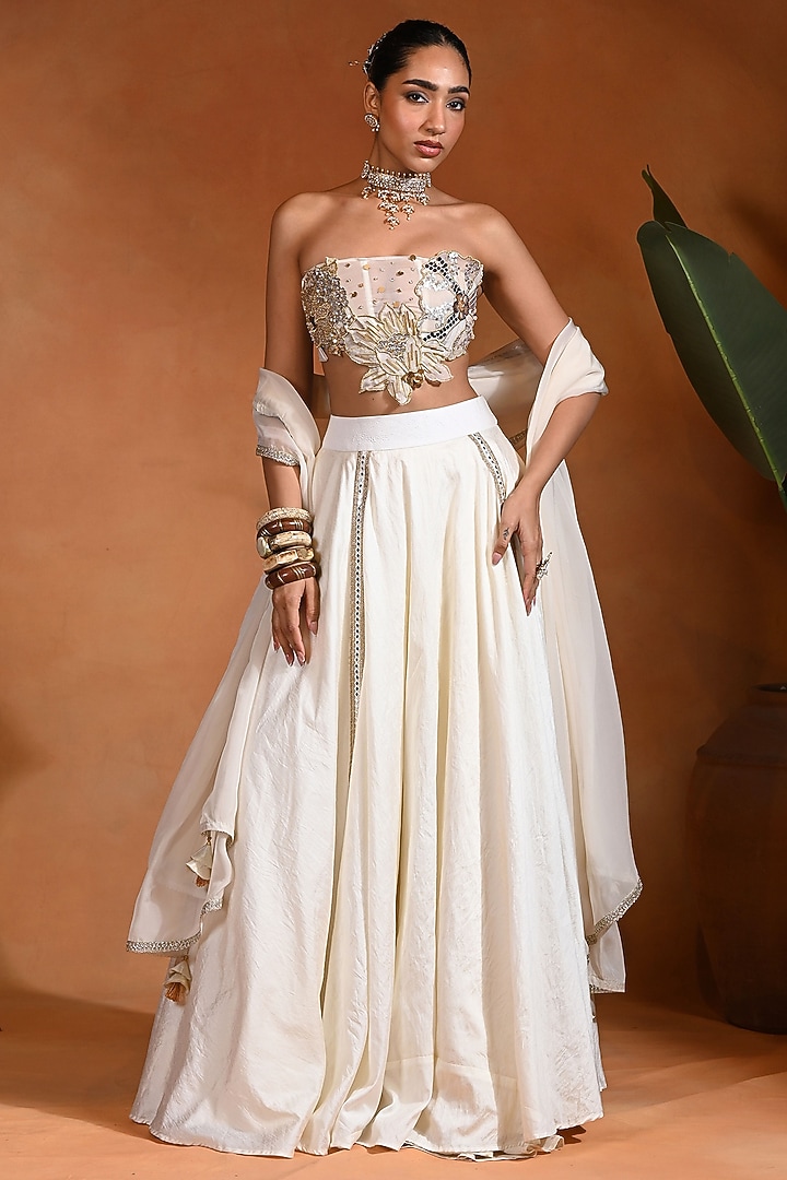 Ivory Dupion Silk Mirror Embroidered Wedding Lehenga Set by Rishi & Vibhuti at Pernia's Pop Up Shop