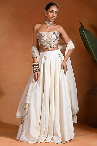 Ivory Dupion Silk Mirror Embroidered Lehenga Set by Rishi & Vibhuti