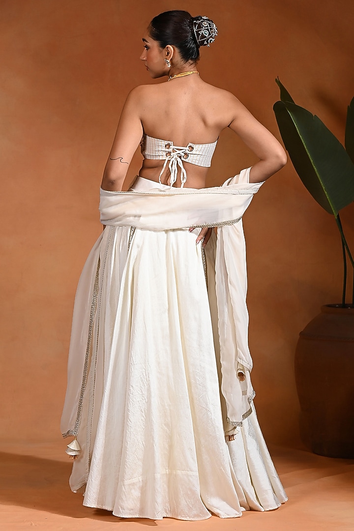 Ivory Dupion Silk Mirror Embroidered Wedding Lehenga Set by Rishi & Vibhuti at Pernia's Pop Up Shop