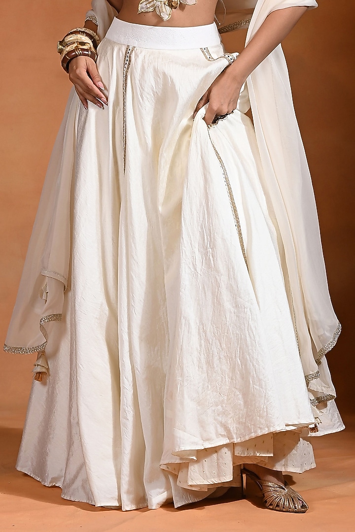 Ivory Dupion Silk Mirror Embroidered Wedding Lehenga Set by Rishi & Vibhuti at Pernia's Pop Up Shop