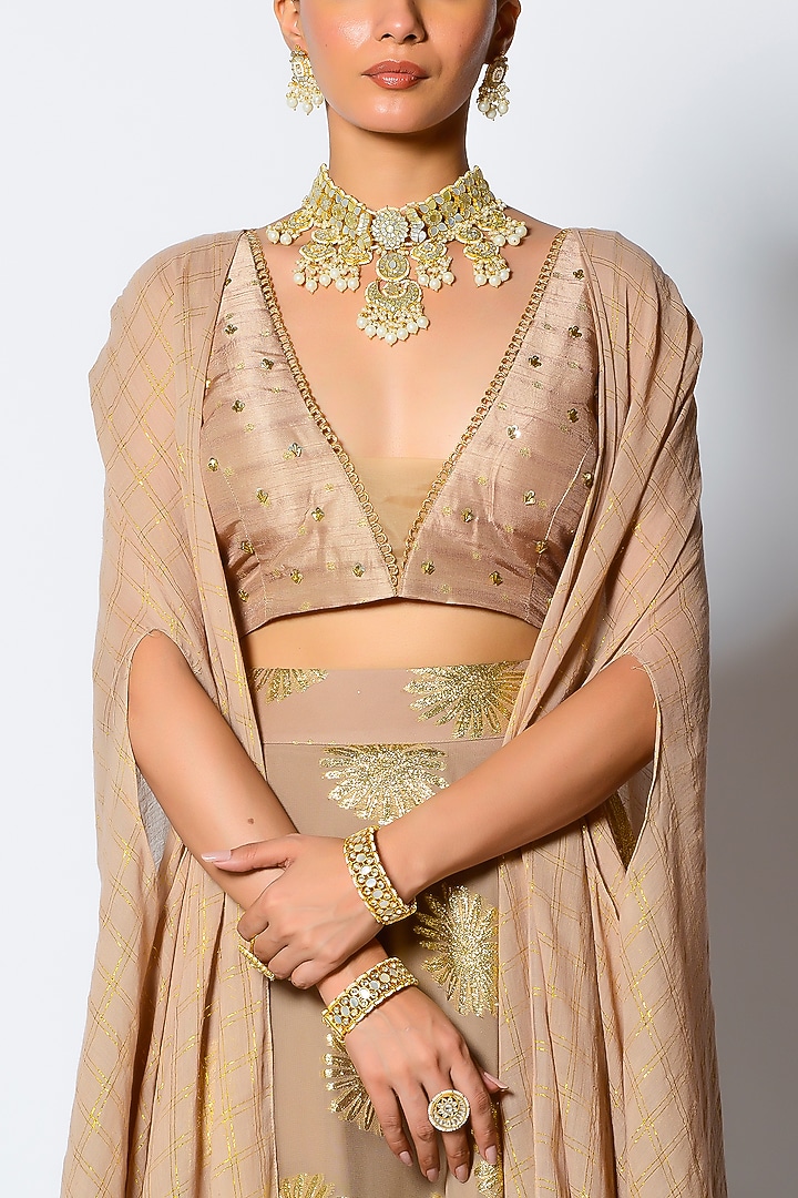 Golden Embroidered Circular Skirt Set With Cape by Rishi & Vibhuti at Pernia's Pop Up Shop