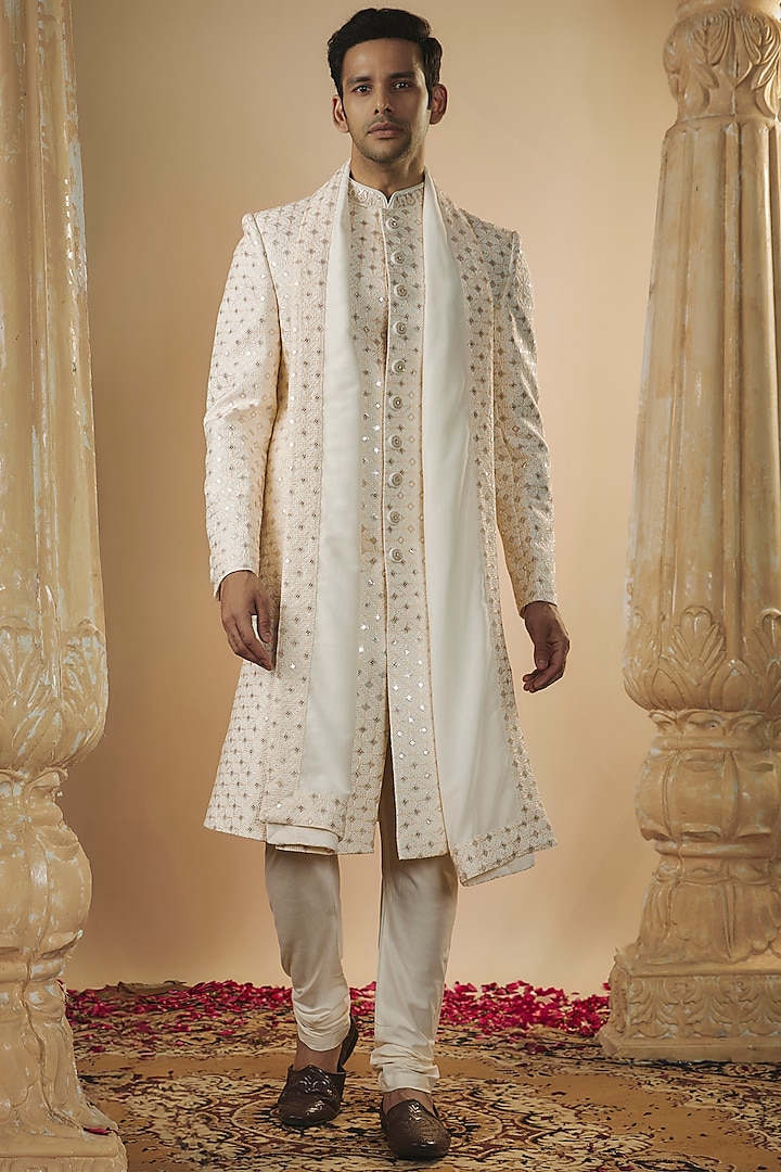 Cream-White Lucknowi Fabric Mirror Work Sherwani Set by RIYAASAT
