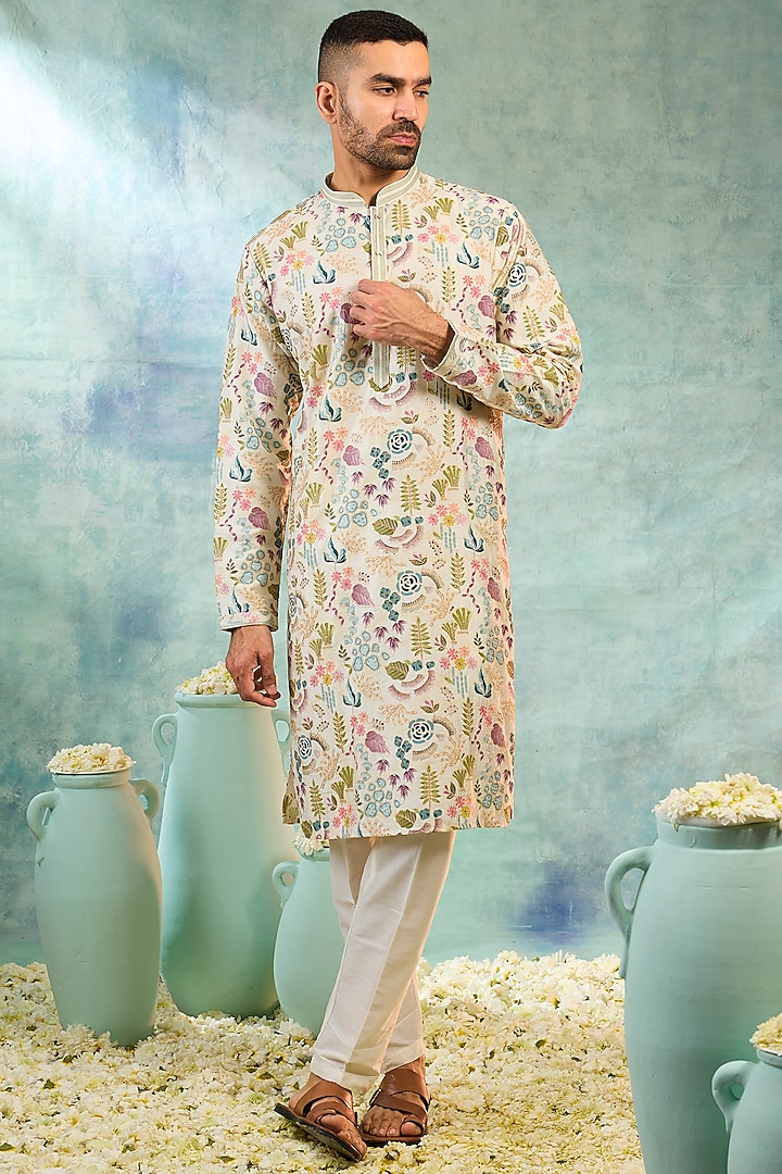 White Silk Embroidered Kurta Set by RIYAASAT