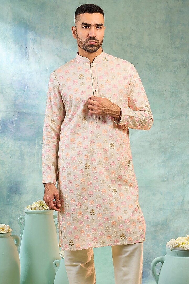 Ivory Silk Threadwork Kurta Set by RIYAASAT at Pernia's Pop Up Shop
