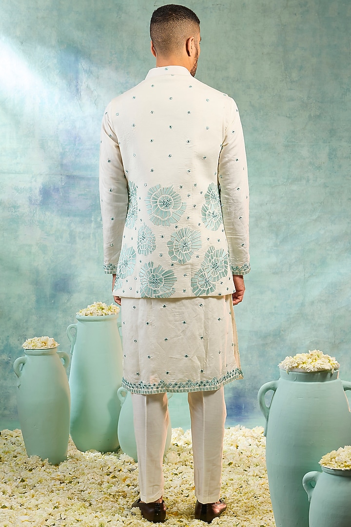 Pearl White Silk Mirror Embellished Koti Set by RIYAASAT at Pernia's Pop Up Shop