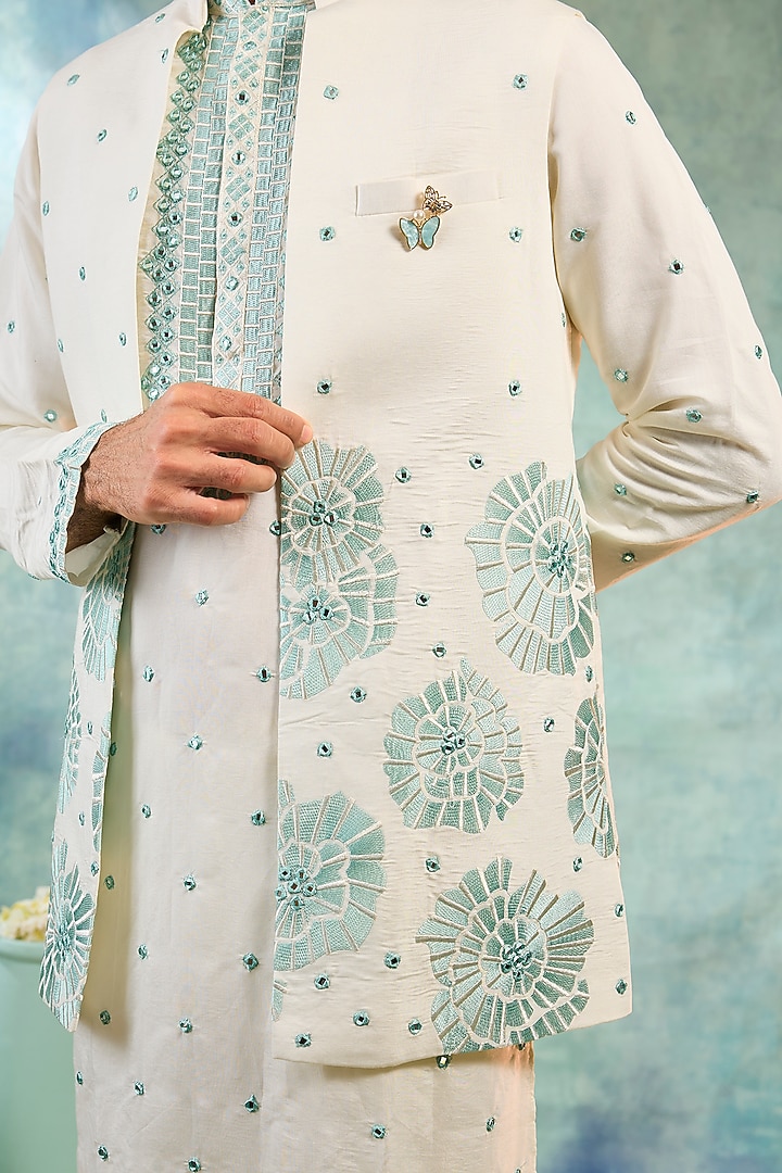 Pearl White Silk Mirror Embellished Koti Set by RIYAASAT at Pernia's Pop Up Shop