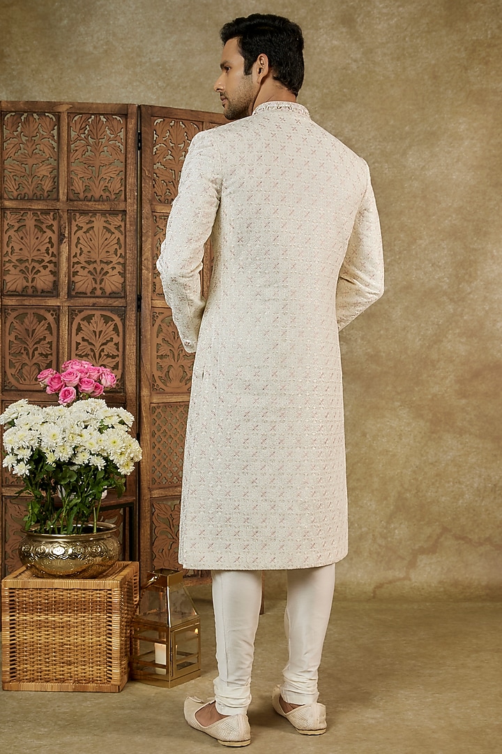 Seashell White Lucknowi Velvet Hand Work Wedding Sherwani Set by RIYAASAT at Pernia's Pop Up Shop