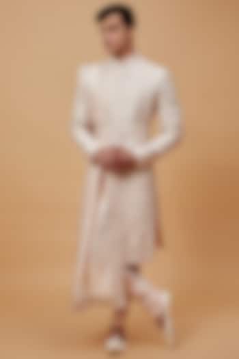 Peach Raw Silk Embroidered Sherwani Set by RIYAASAT