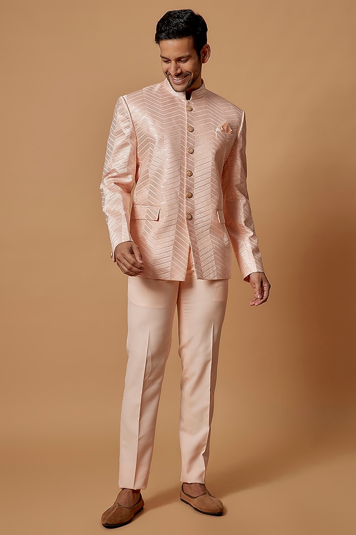 Peach Suiting Fabric Embroidered Jodhpuri Set by RIYAASAT