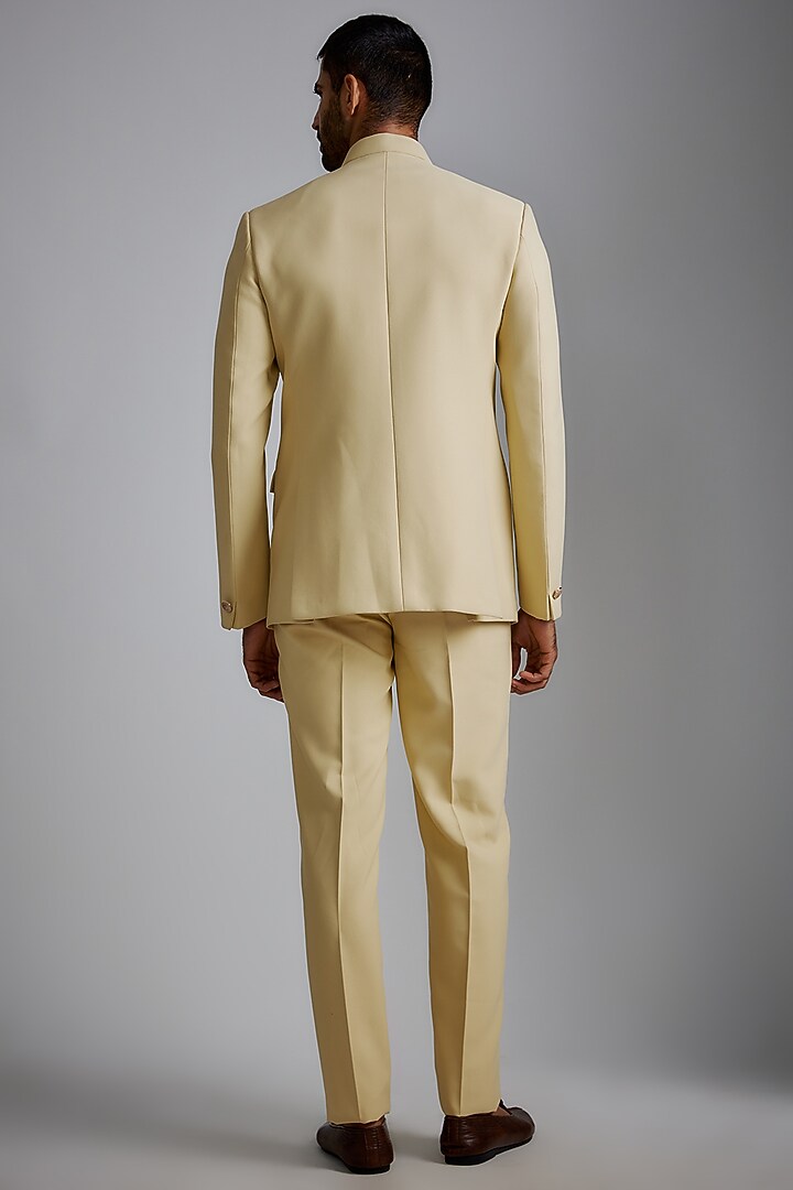 Cream Suiting Fabric Bandhgala Set by RIYAASAT at Pernia's Pop Up Shop