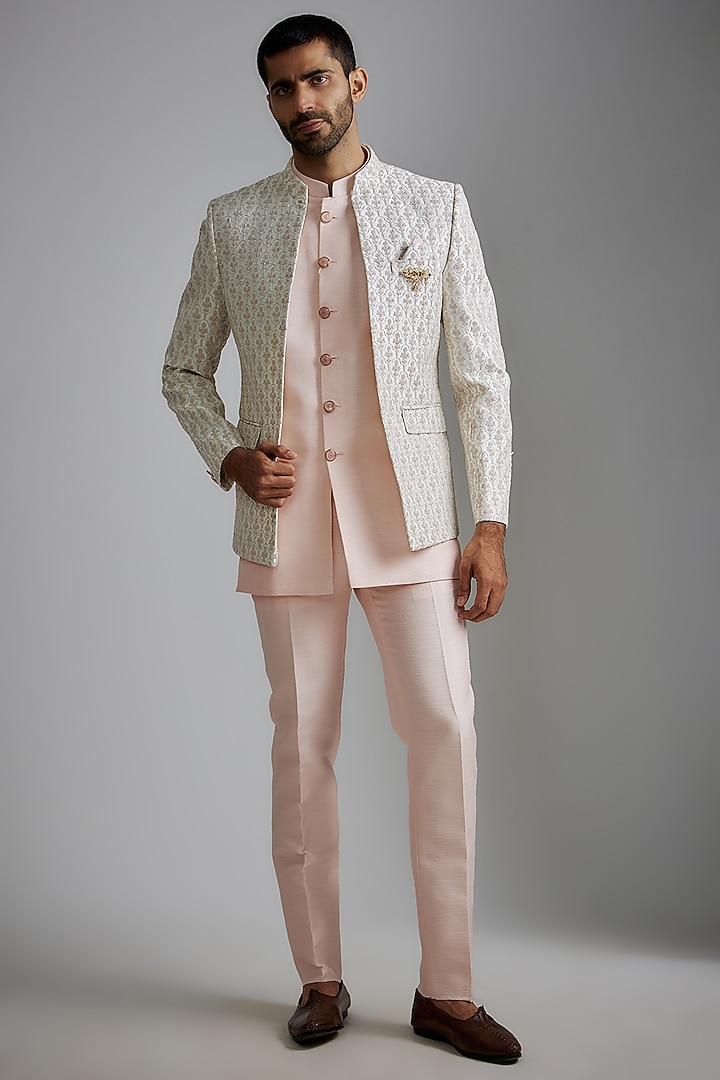 Cream Silk Embroidered Indowestern Jacket Set by RIYAASAT at Pernia's Pop Up Shop