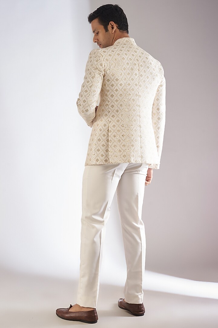 White Silk Embroidered Bandhgala Set by RIYAASAT at Pernia's Pop Up Shop