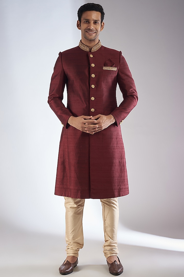 Wine Raw Silk Sherwani Set by RIYAASAT