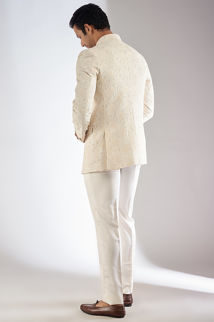 White Silk Embroidered Bandhgala Set by RIYAASAT at Pernia's Pop Up Shop
