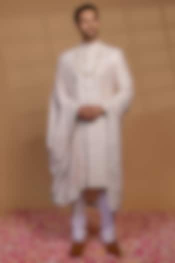 Light Pink Raw Silk Sequins Embellished Wedding Sherwani Set by RIYAASAT at Pernia's Pop Up Shop