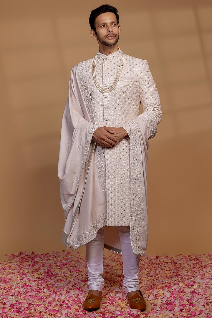 Light Pink Raw Silk Sequins Embellished Wedding Sherwani Set by RIYAASAT at Pernia's Pop Up Shop