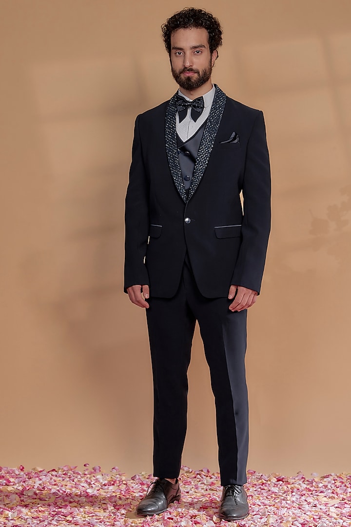 Deep Blue Suiting Fabric Embroidered Tuxedo Set by RIYAASAT