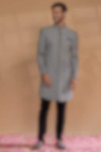 Black Raw Silk Thread Embroidered Sherwani Set by RIYAASAT at Pernia's Pop Up Shop